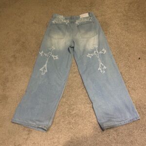 Blue Relaxed Fit Jeans with Distressed Details